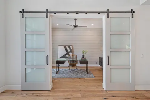 a living room with furniture or window and a table