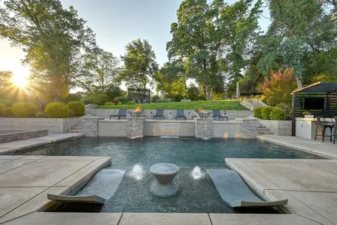 a outdoor living space with patio furniture and garden view