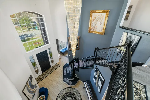 a view of an entryway with wooden floor