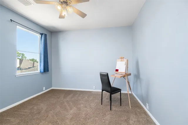 a room with furniture and a window