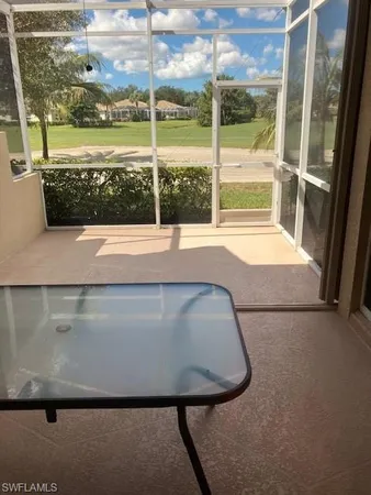 a view of a floor to ceiling window and an outdoor view