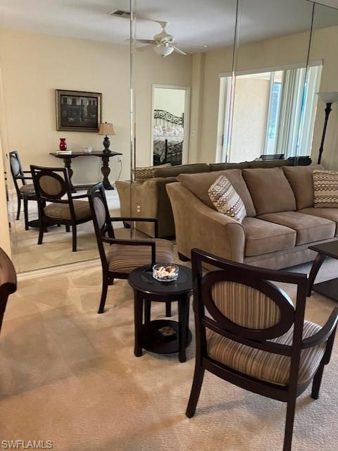 1911 Morning Sun Lane Naples, FL 34119 - Photo 6 of 17 a living room with furniture and a wooden floor