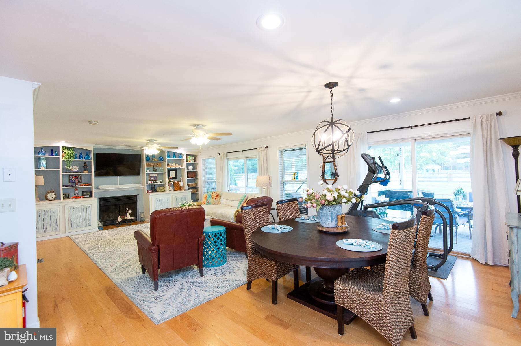 12136 Holly Road Ridgely, MD 21660 - Photo 16 of 136 a view of a dining room with furniture window and wooden floor
