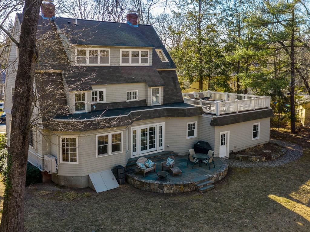 22 Cushing Road Wellesley, MA 02481 - Photo 3 of 28 a front view of house with a garden