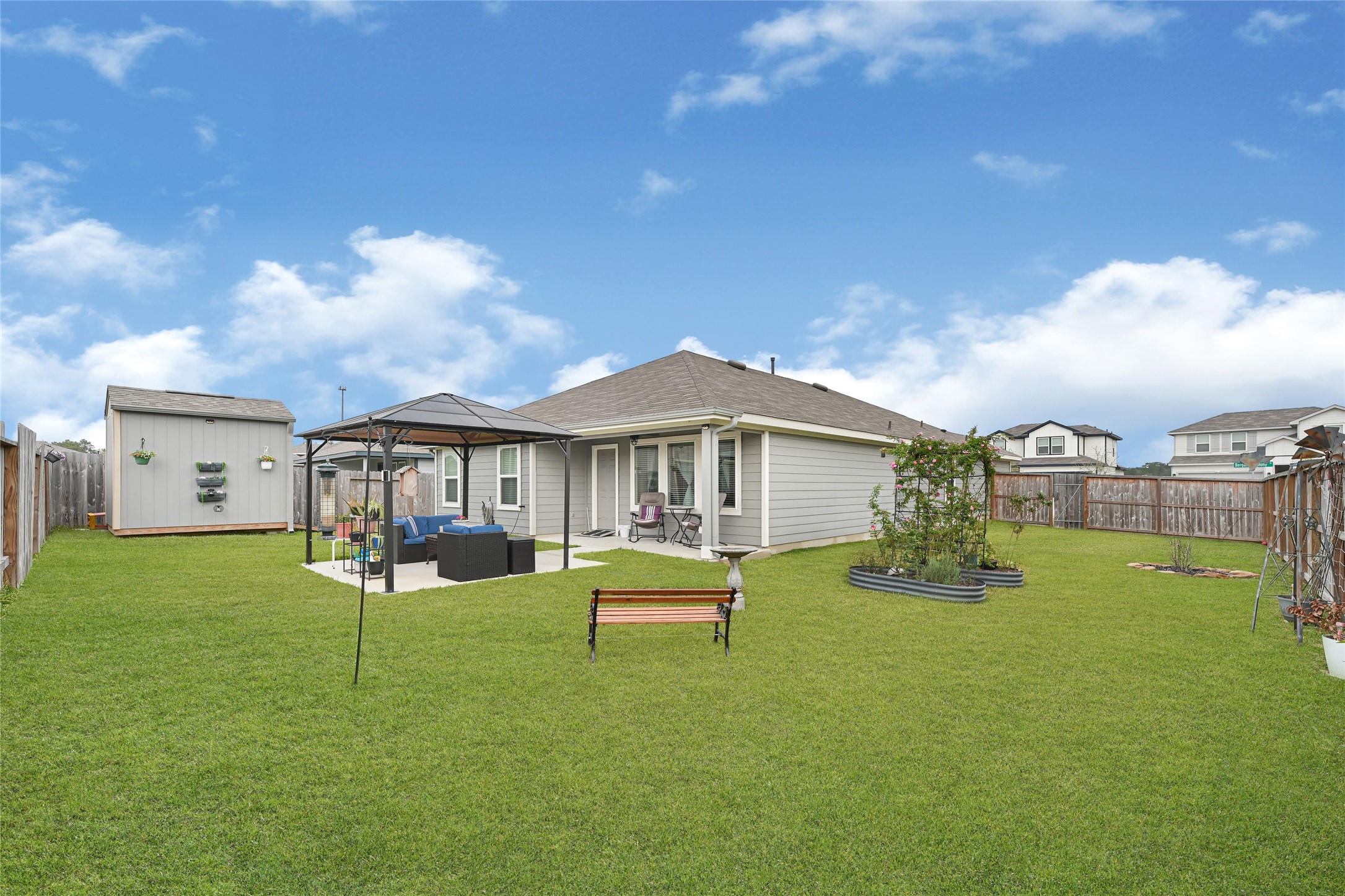 14968 Bergamot Colony Street Splendora, TX 77372 - Photo 5 of 25 a view of a house with a yard