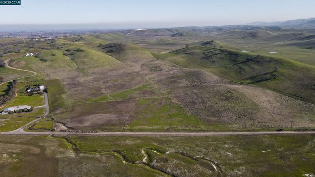 a view of mountains in the distance