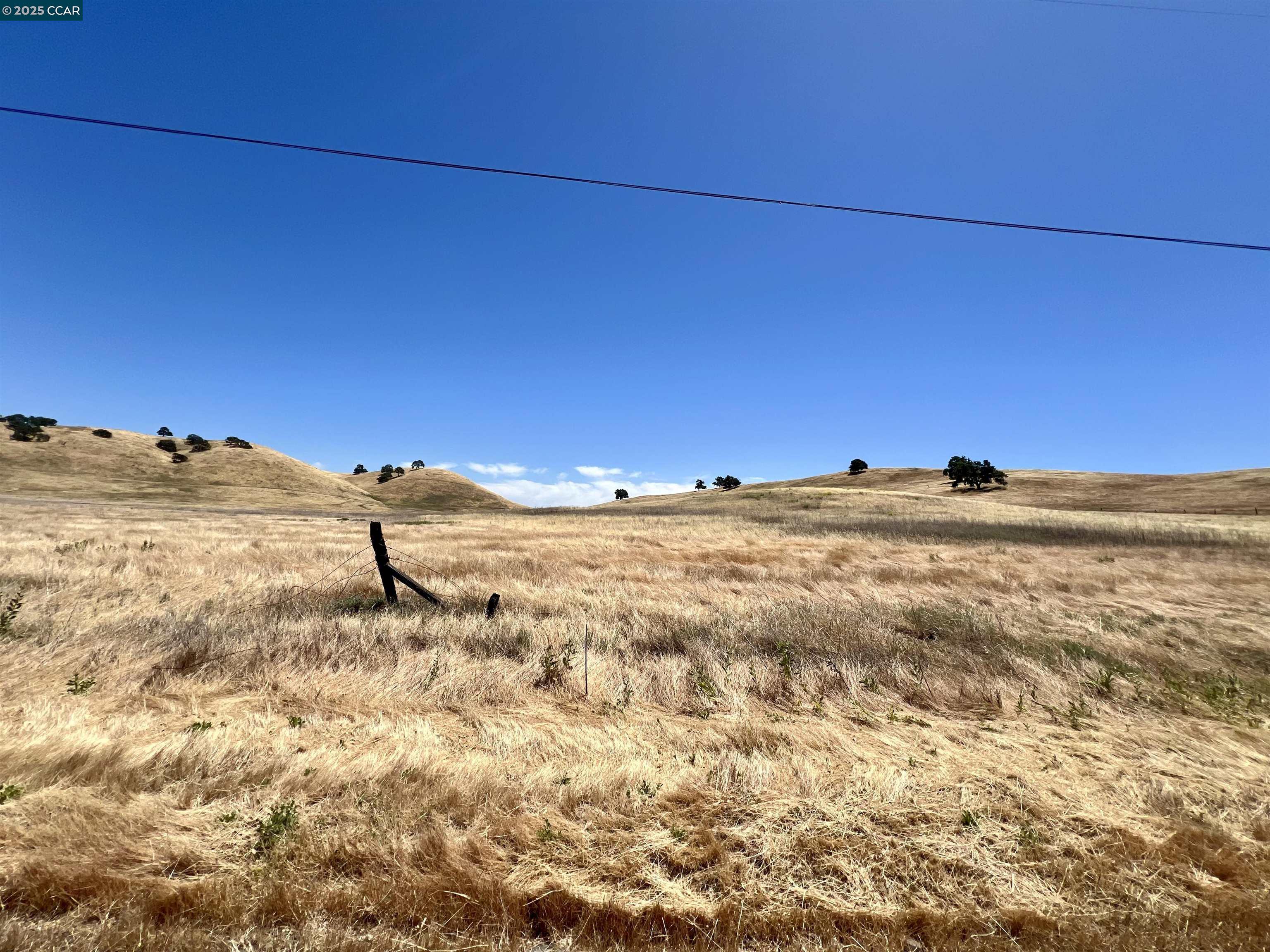 Briones Valley Road Brentwood, CA 94513 - Photo 40 of 44 a view of a ocean with a mountain in the background