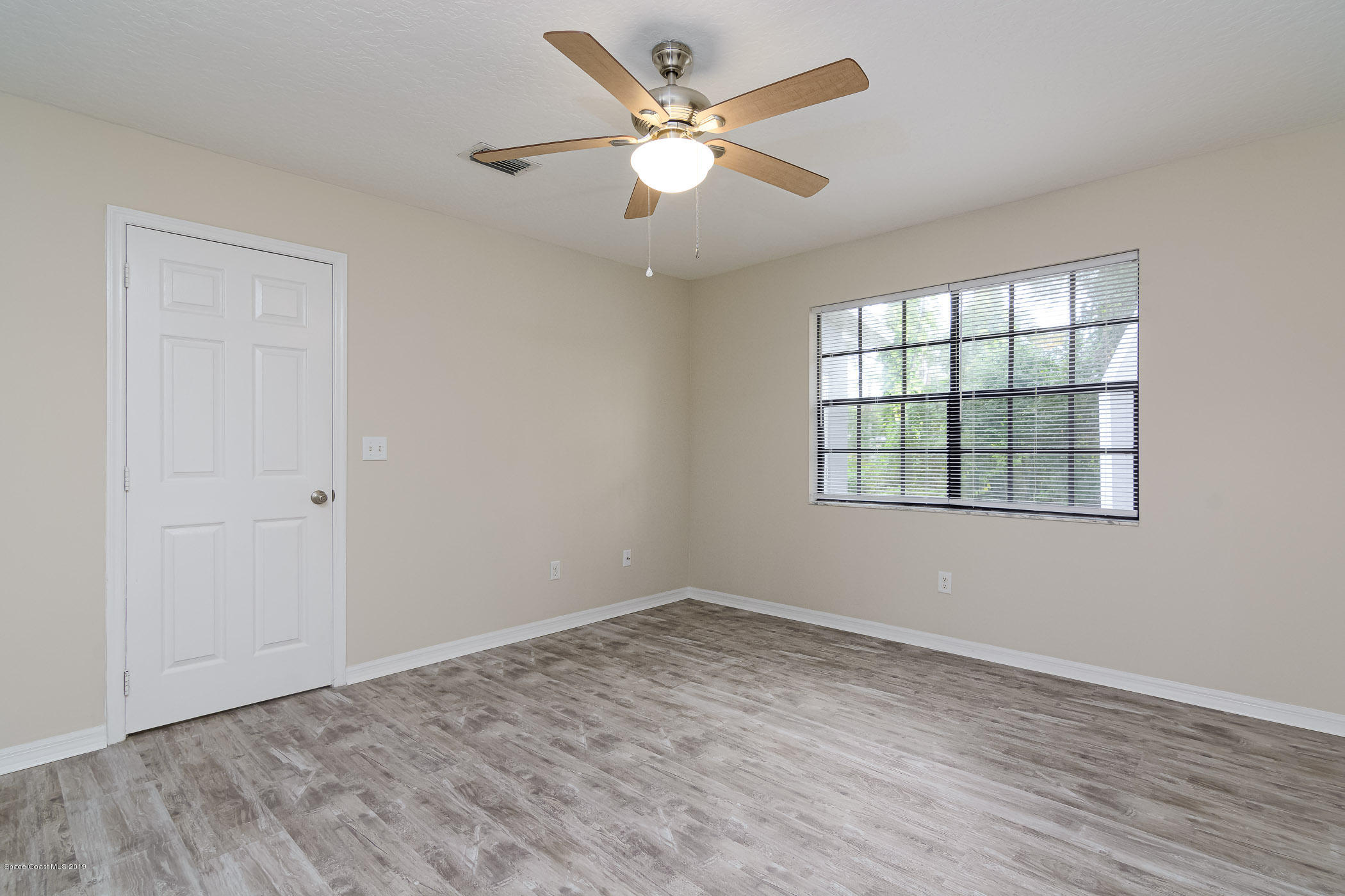 6965 Cairo Road Cocoa, FL 32927 - Photo 17 of 34 Master Bedroom