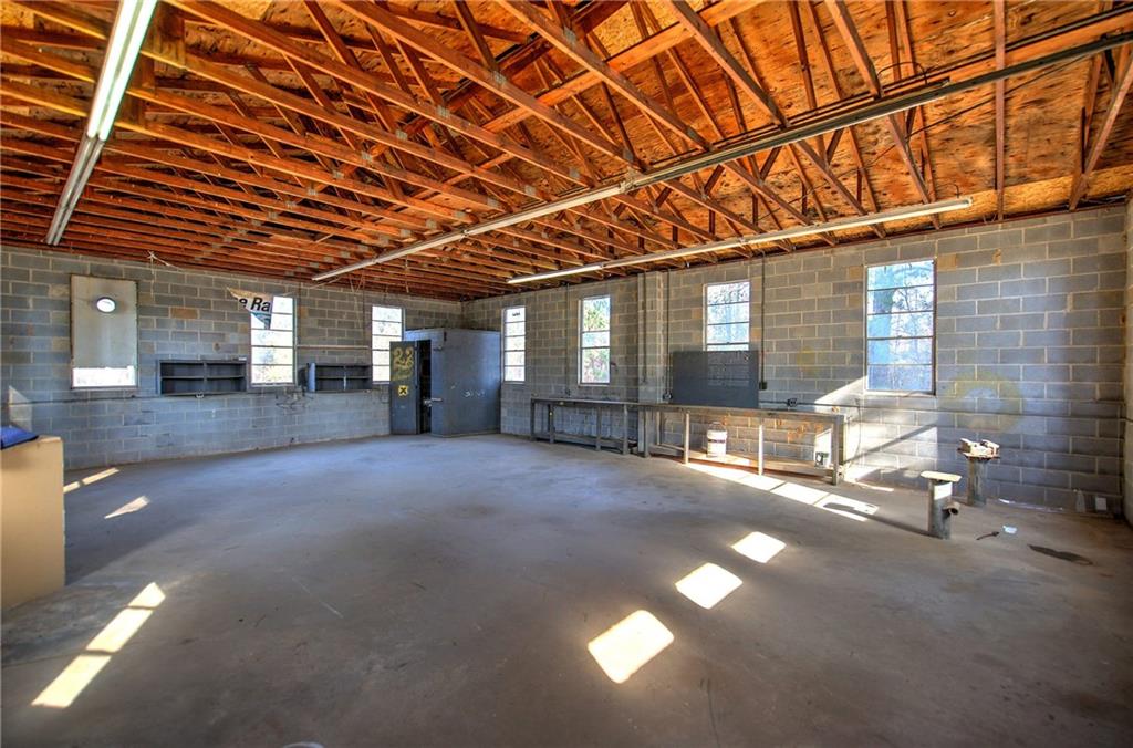 2193 West Ellis Road Griffin, GA 30223 - Photo 18 of 26 a view of an empty room with windows