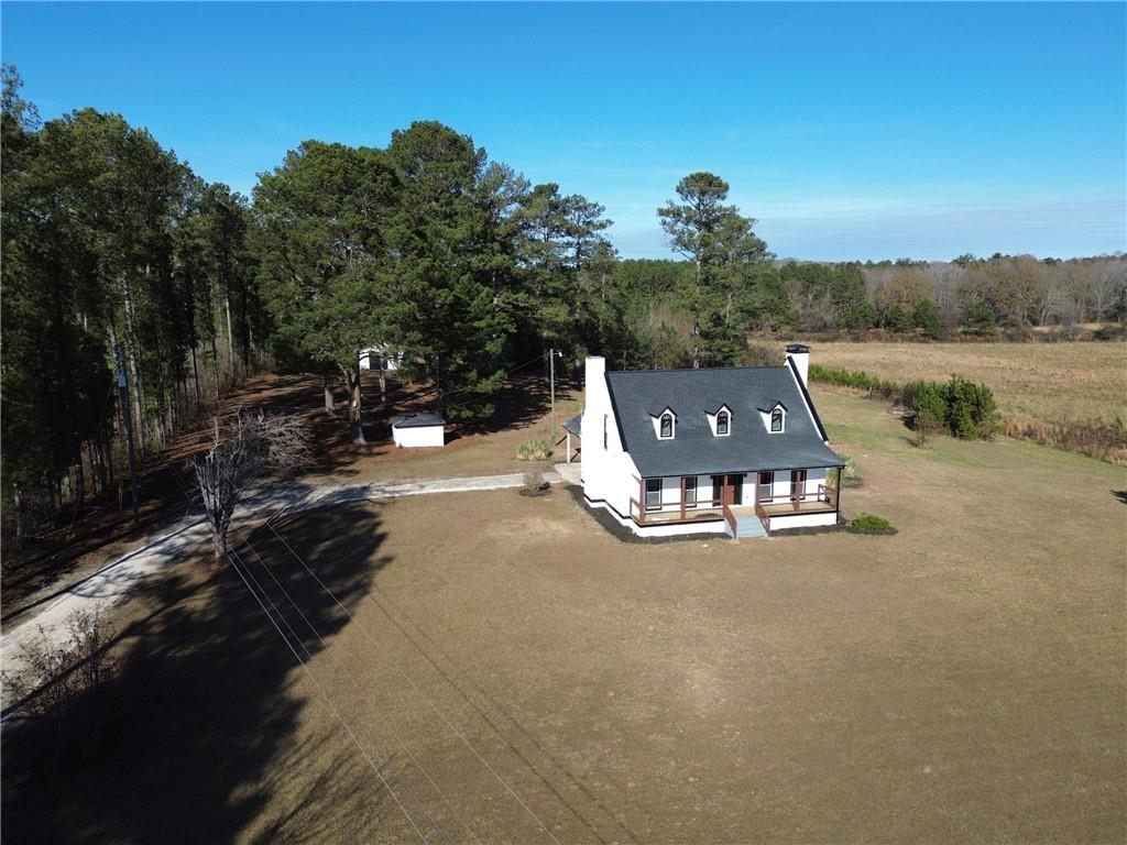 2193 West Ellis Road Griffin, GA 30223 - Photo 24 of 26 a view of a lake with mountain view