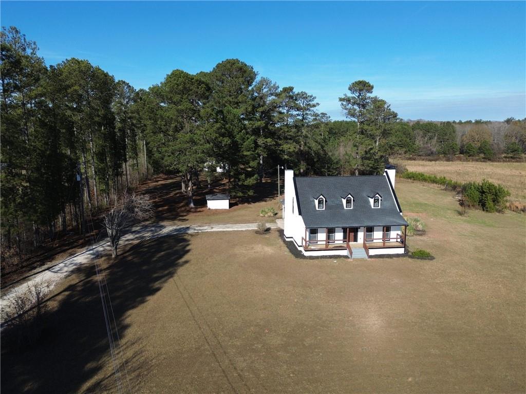 2193 West Ellis Road Griffin, GA 30223 - Photo 25 of 26 a view of a house with a yard and sitting area