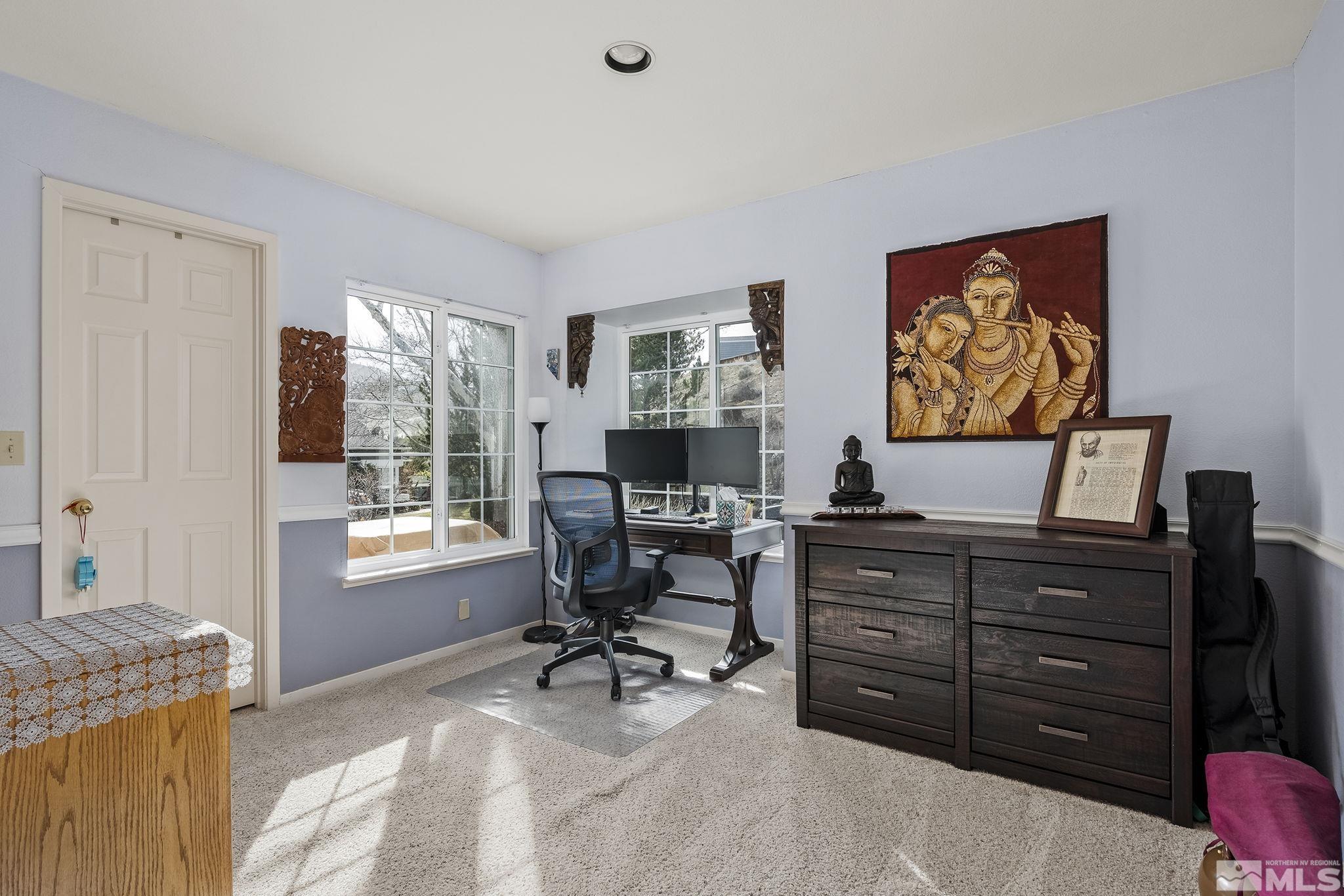 2390 High Terrace Drive Reno, NV 89509 - Photo 18 of 36 a view of a workspace with furniture and a window