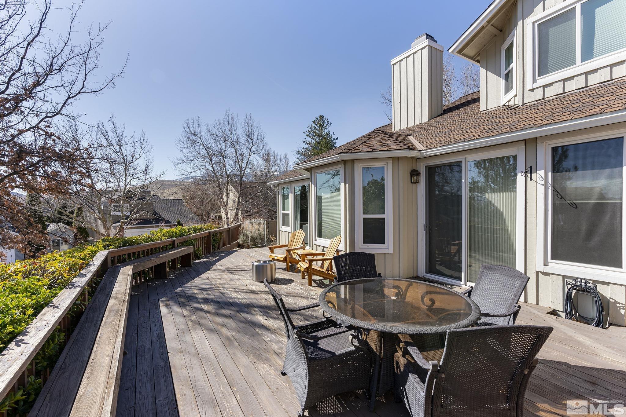 2390 High Terrace Drive Reno, NV 89509 - Photo 21 of 36 a backyard of a house with table and chairs