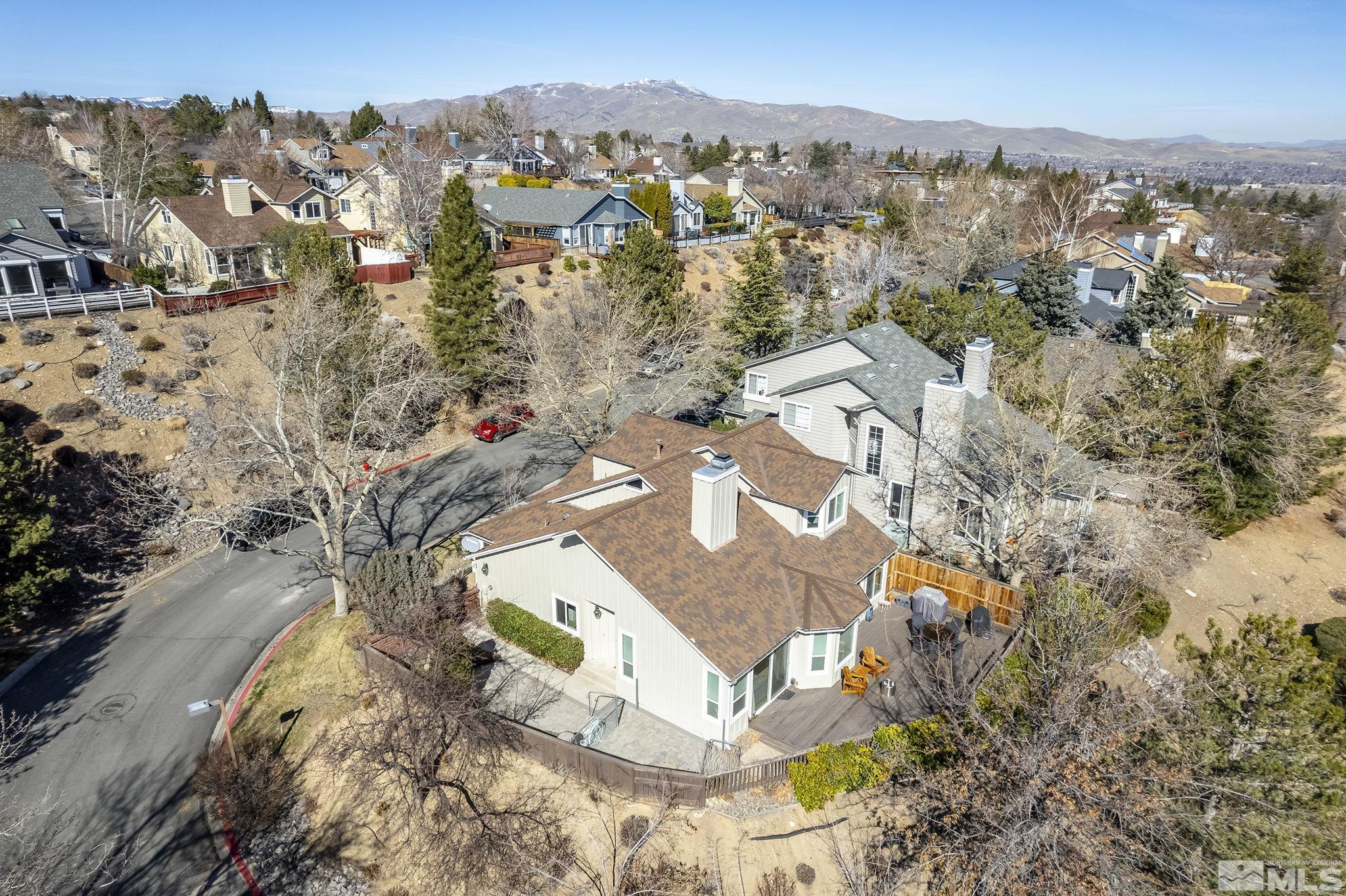 2390 High Terrace Drive Reno, NV 89509 - Photo 25 of 36 an aerial view of a house with a yard