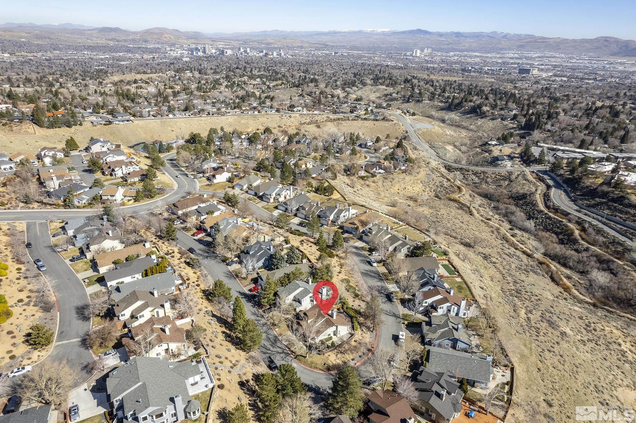 2390 High Terrace Drive Reno, NV 89509 - Photo 26 of 36 an aerial view of house with yard and mountain view