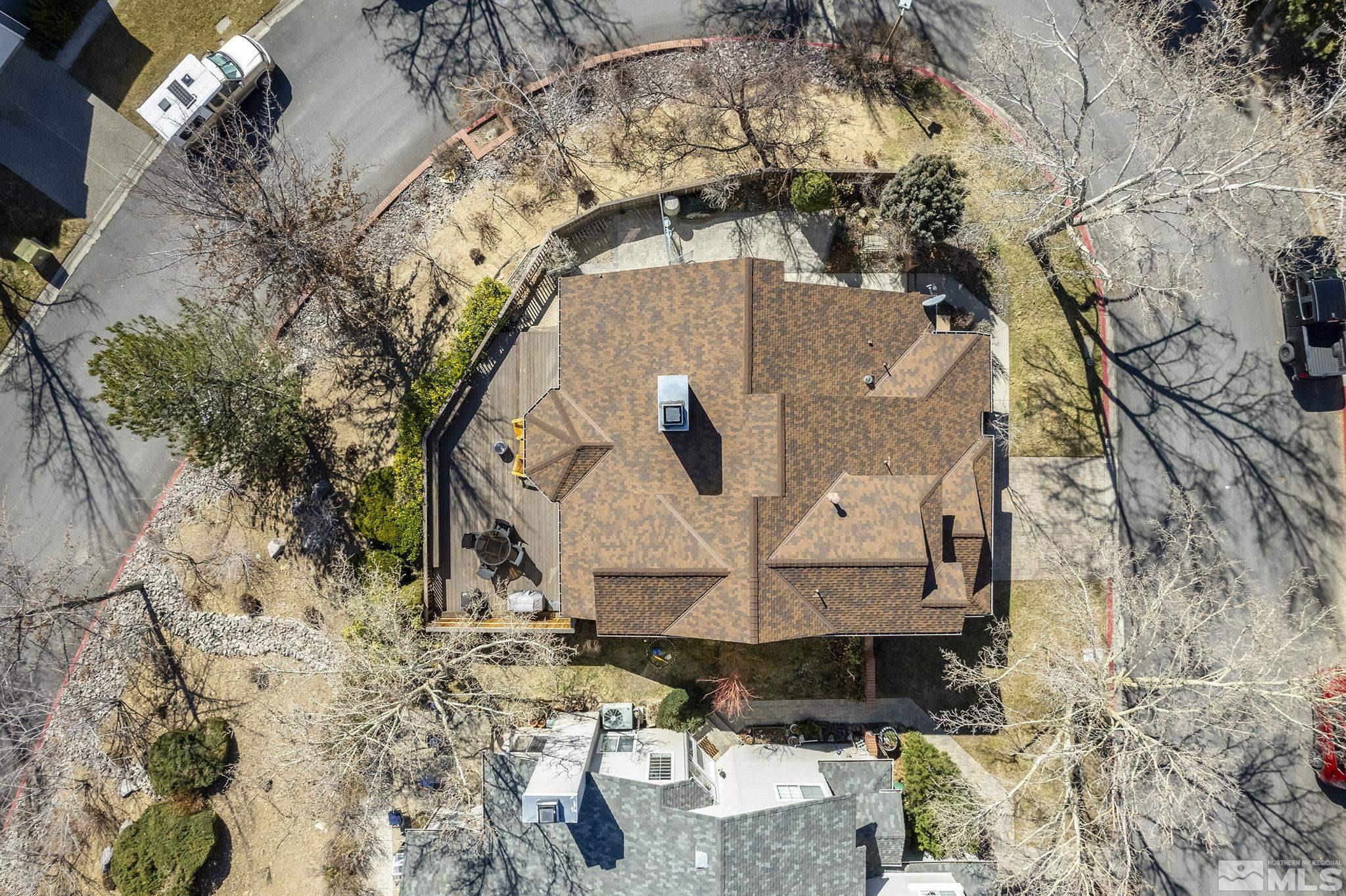 2390 High Terrace Drive Reno, NV 89509 - Photo 35 of 36 a aerial view of a house with large trees