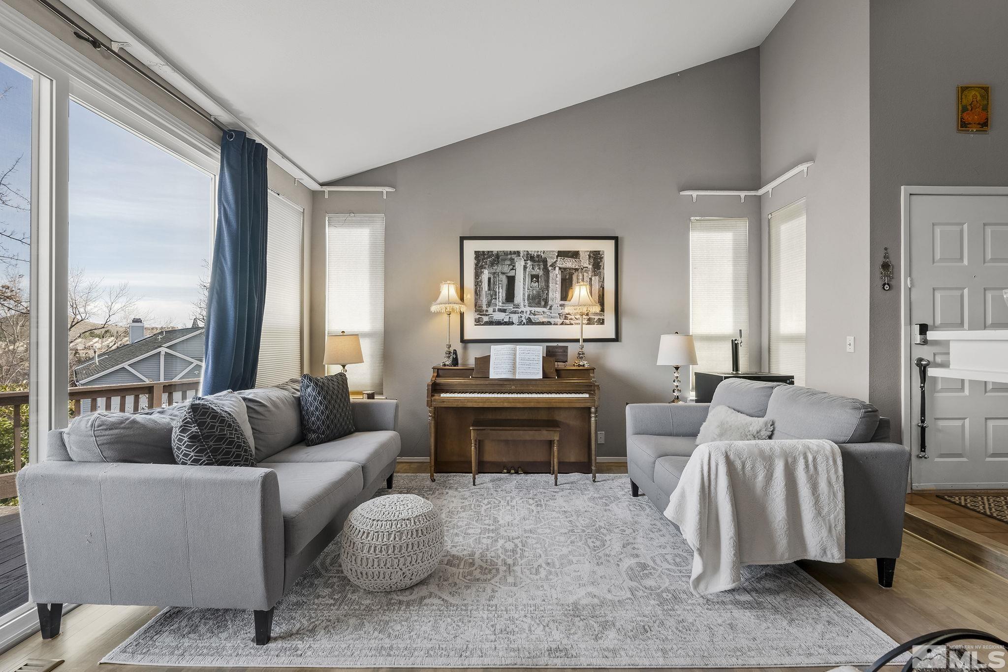 2390 High Terrace Drive Reno, NV 89509 - Photo 5 of 36 a living room with furniture and a large window