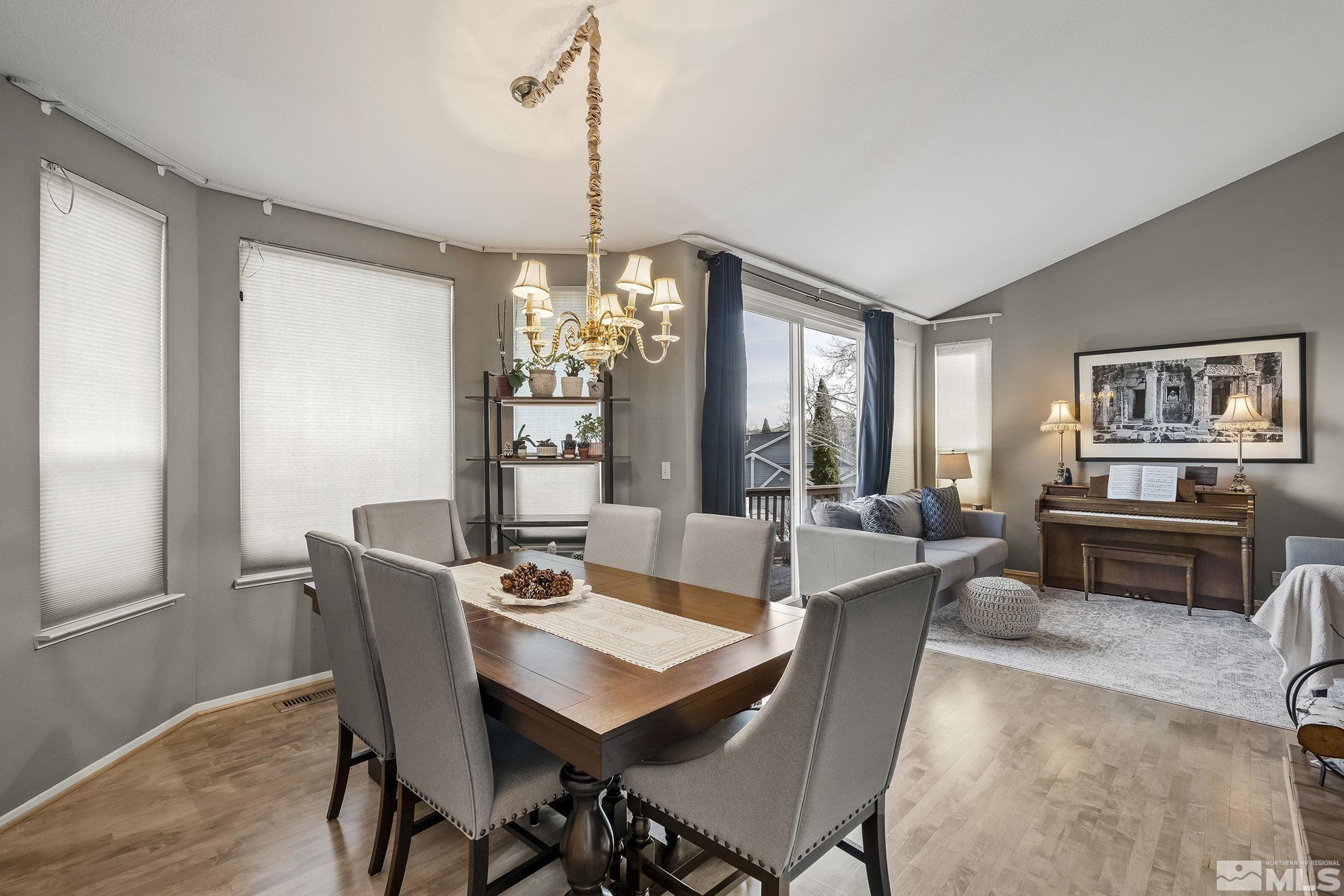 2390 High Terrace Drive Reno, NV 89509 - Photo 6 of 36 a view of a dining room with furniture window and wooden floor