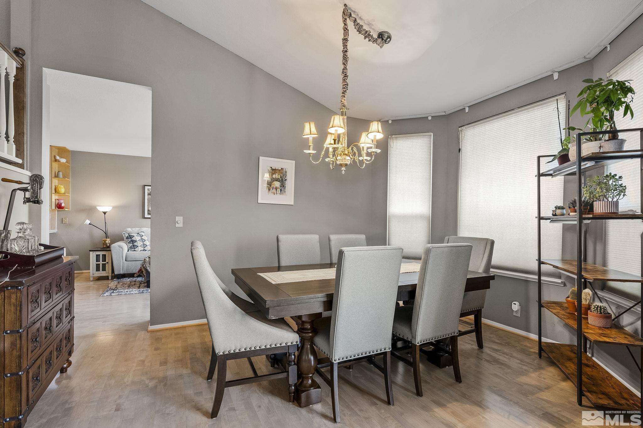 2390 High Terrace Drive Reno, NV 89509 - Photo 8 of 36 a view of a dining room with furniture window and wooden floor