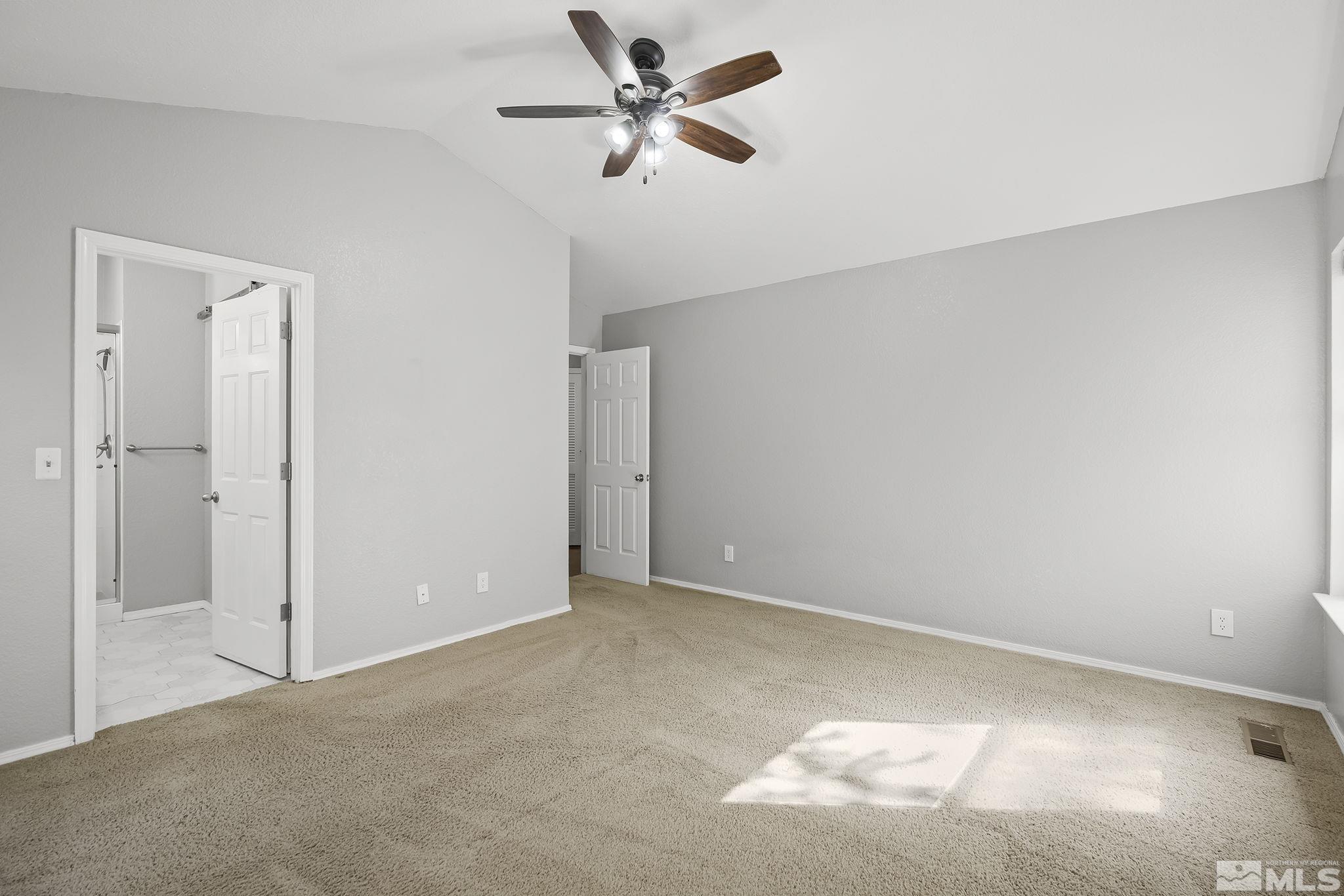 4755 Scenic Hill Circle Reno, NV 89523 - Photo 13 of 20 a view of a big room with carpet