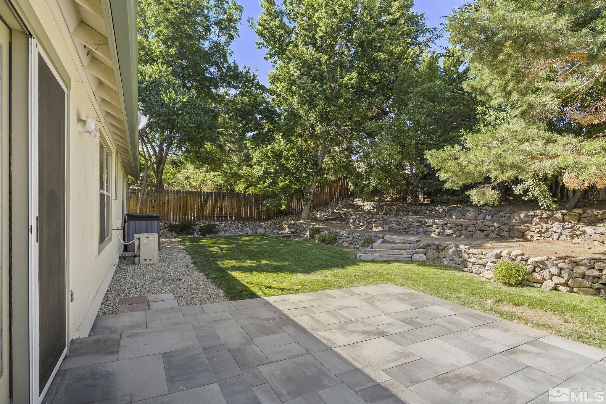 4755 Scenic Hill Circle Reno, NV 89523 - Photo 18 of 20 a view of backyard with green space