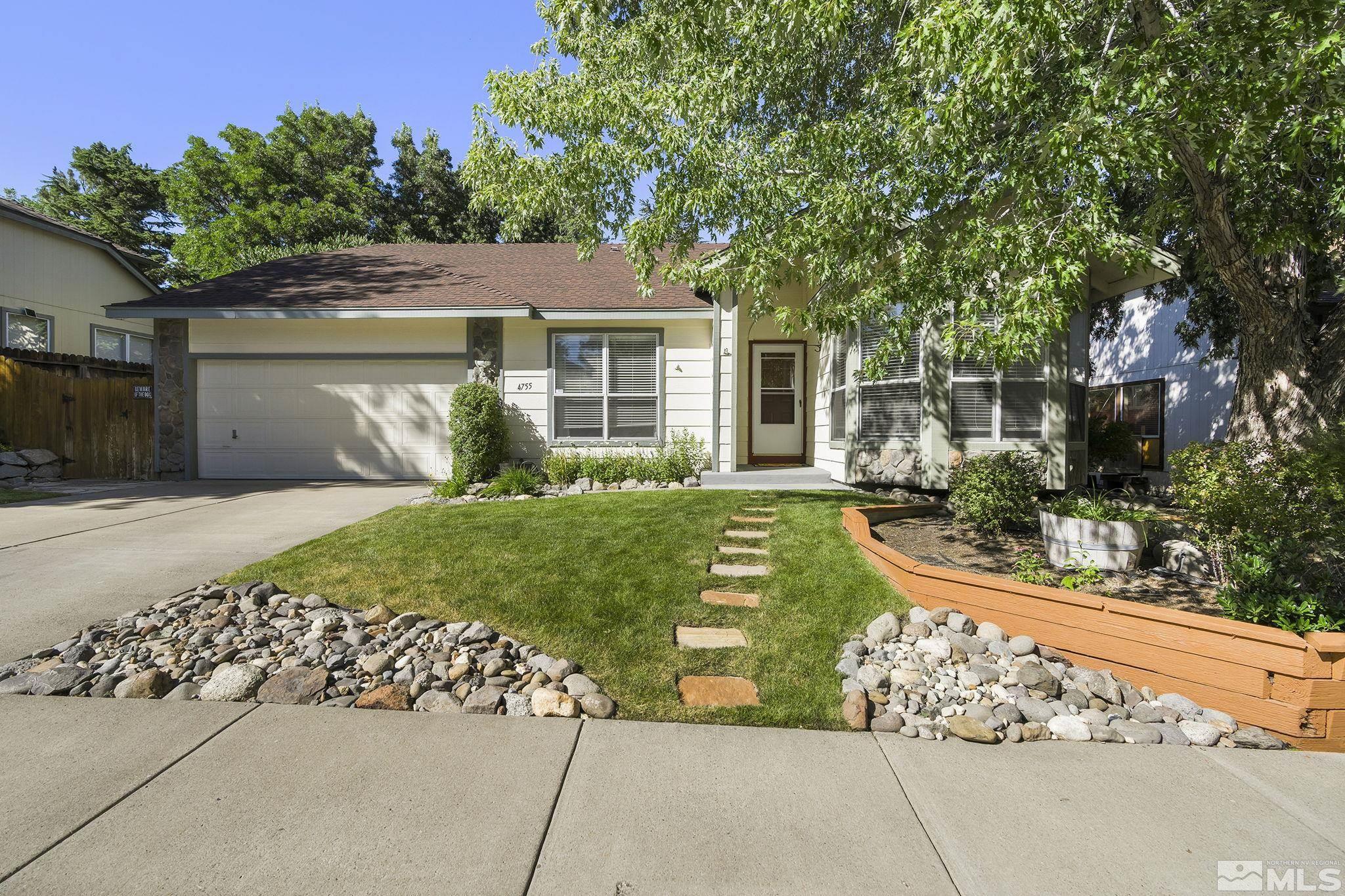 4755 Scenic Hill Circle Reno, NV 89523 - Photo 2 of 20 front view of a house with a yard