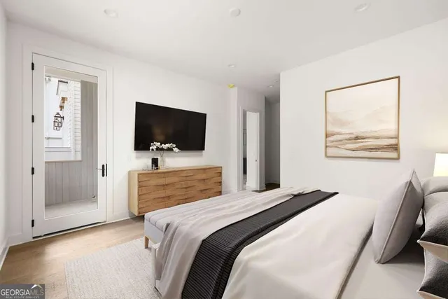 a view of a lake with couches and wooden floor