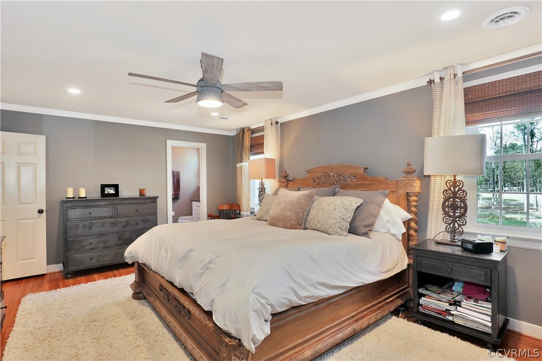 2601 Kentford Road Midlothian, VA 23113 - Photo 21 of 35 a bedroom with a bed and wooden floor