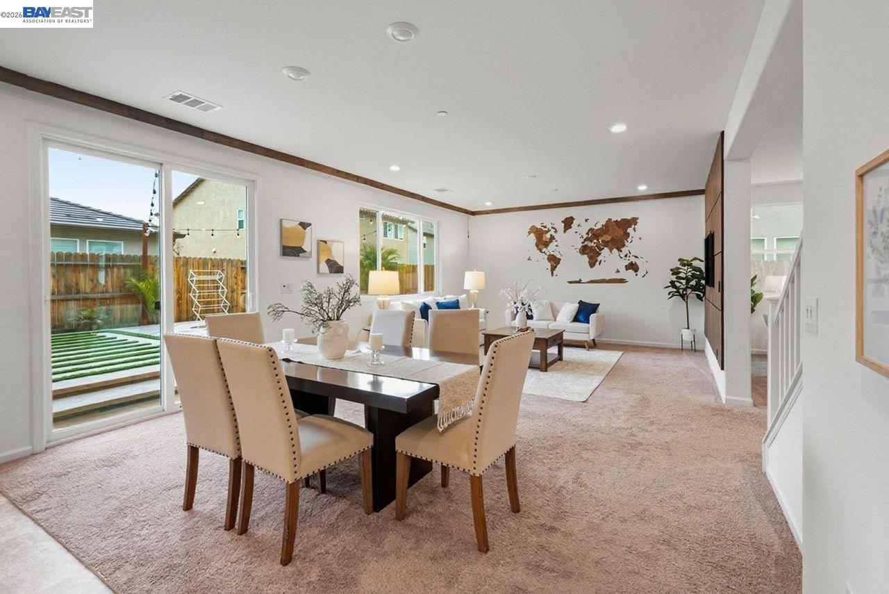 1444 Meridian Street Manteca, CA 95337 - Photo 17 of 45 a view of a livingroom with furniture and a table