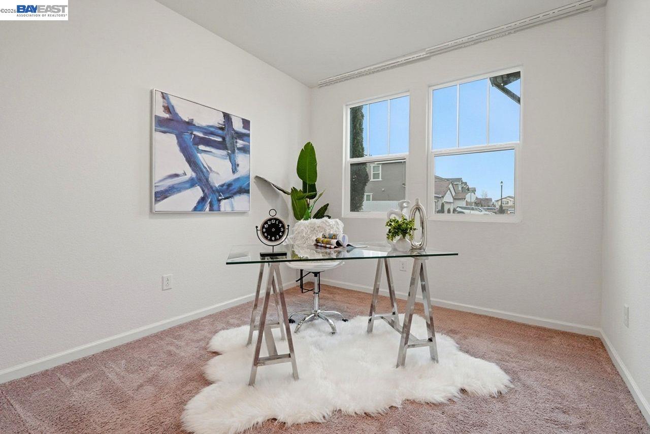 1444 Meridian Street Manteca, CA 95337 - Photo 19 of 45 a view of a workspace with furniture