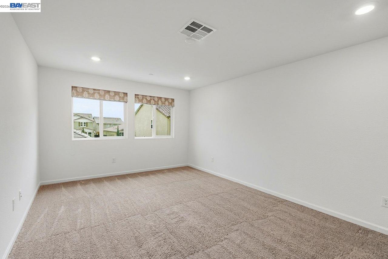 1444 Meridian Street Manteca, CA 95337 - Photo 33 of 45 an empty room with windows