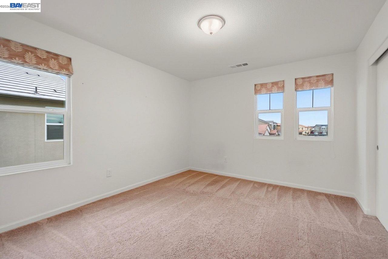 1444 Meridian Street Manteca, CA 95337 - Photo 36 of 45 an empty room with a window