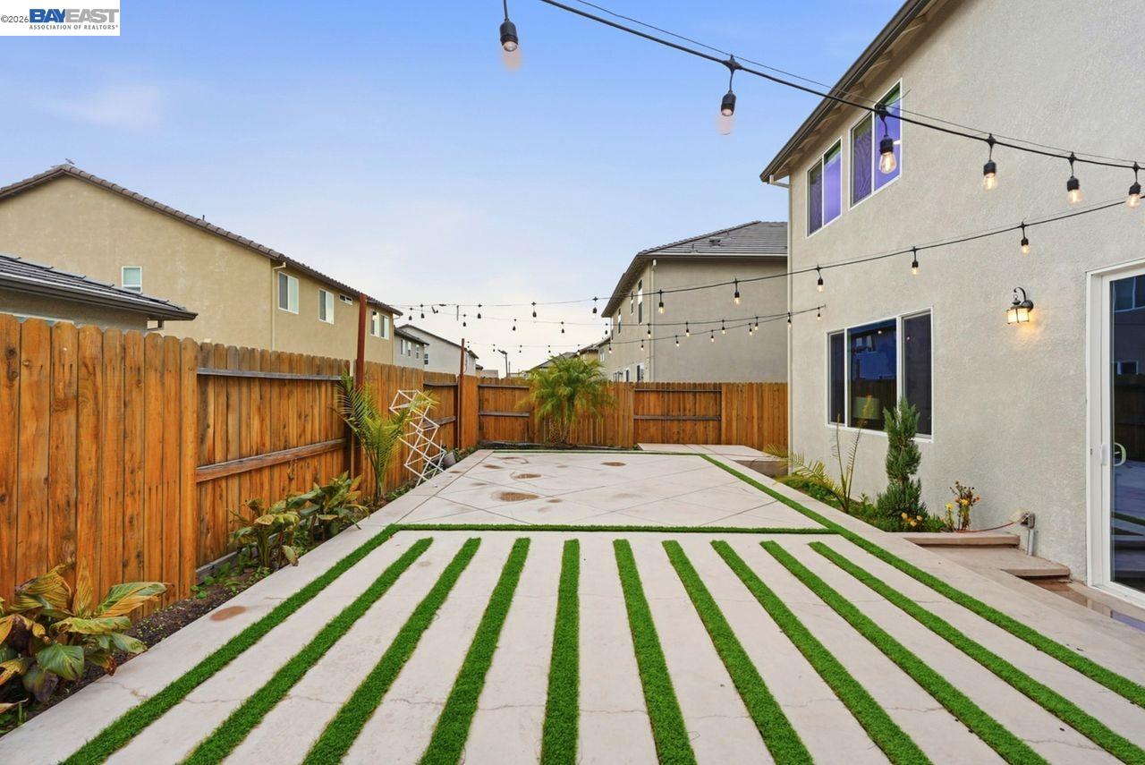 1444 Meridian Street Manteca, CA 95337 - Photo 41 of 45 a front view of a house with a yard