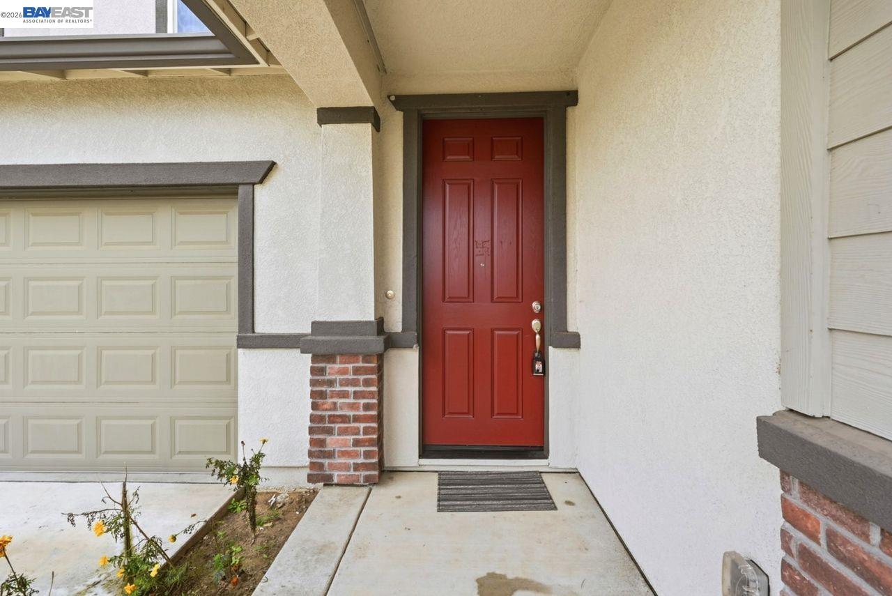 1444 Meridian Street Manteca, CA 95337 - Photo 7 of 45 a view of front door of house