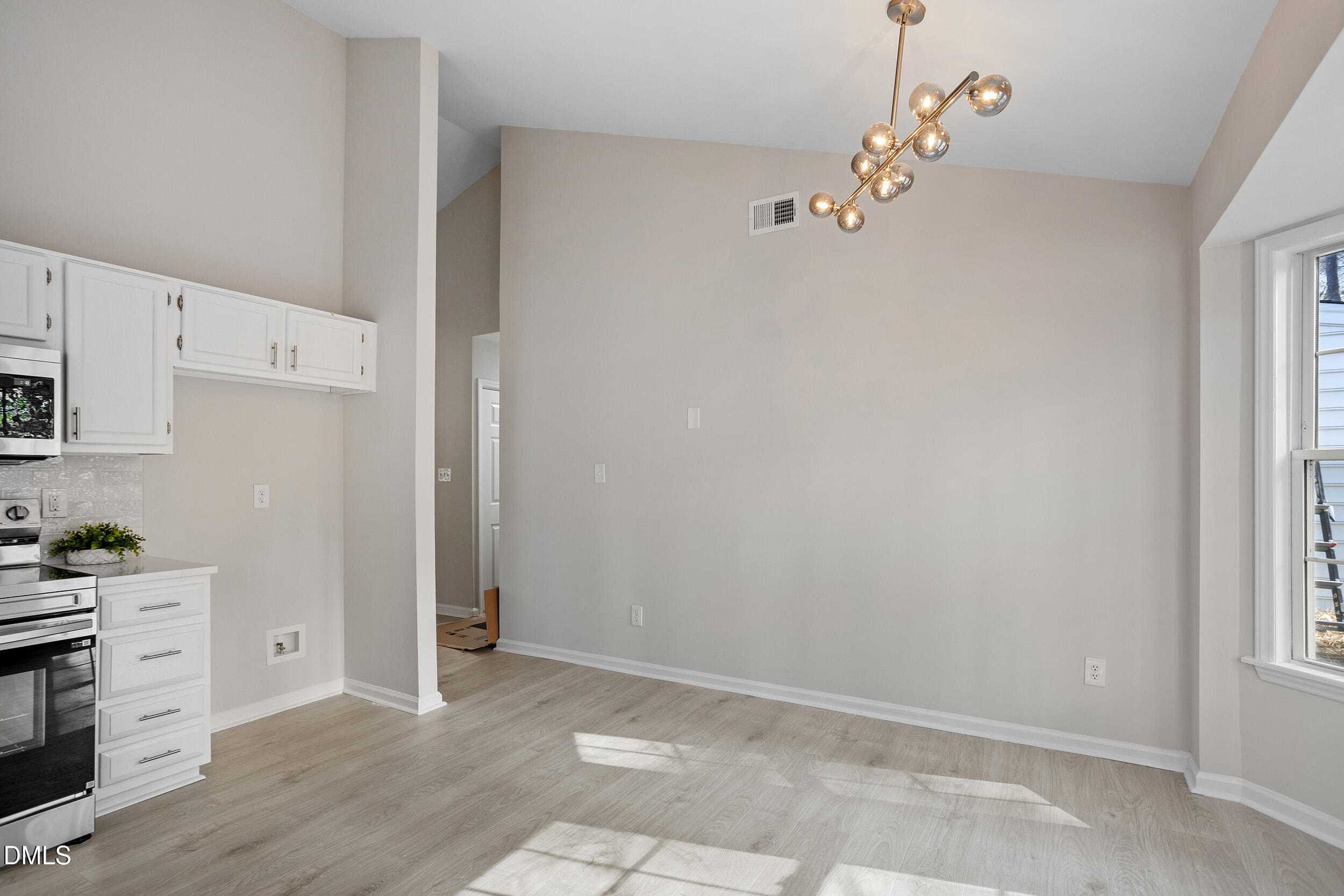 247 Tillamook Drive Wake Forest, NC 27587 - Photo 11 of 30 a view of cabinets and wooden floor