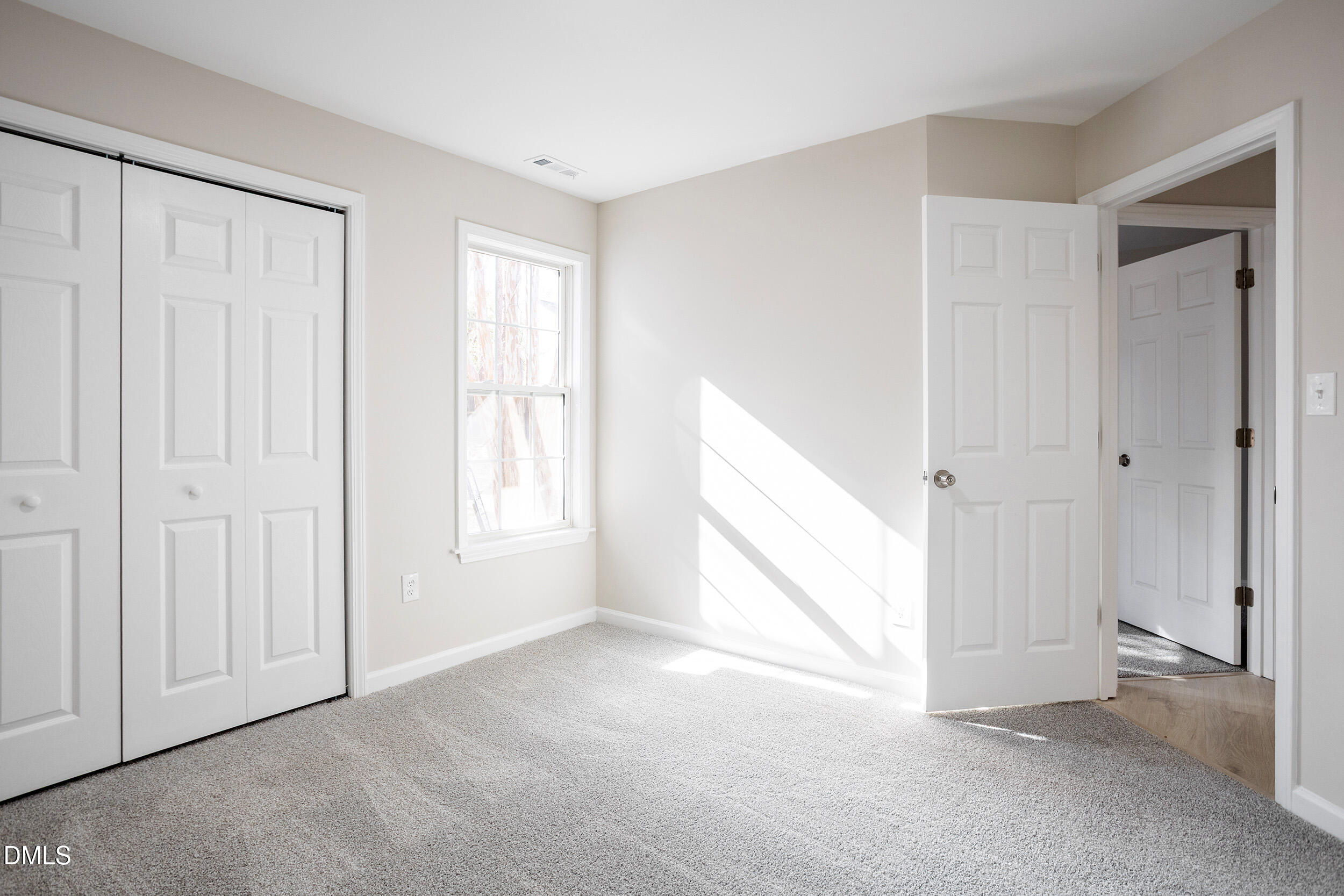 247 Tillamook Drive Wake Forest, NC 27587 - Photo 15 of 30 a view of an empty room with a window