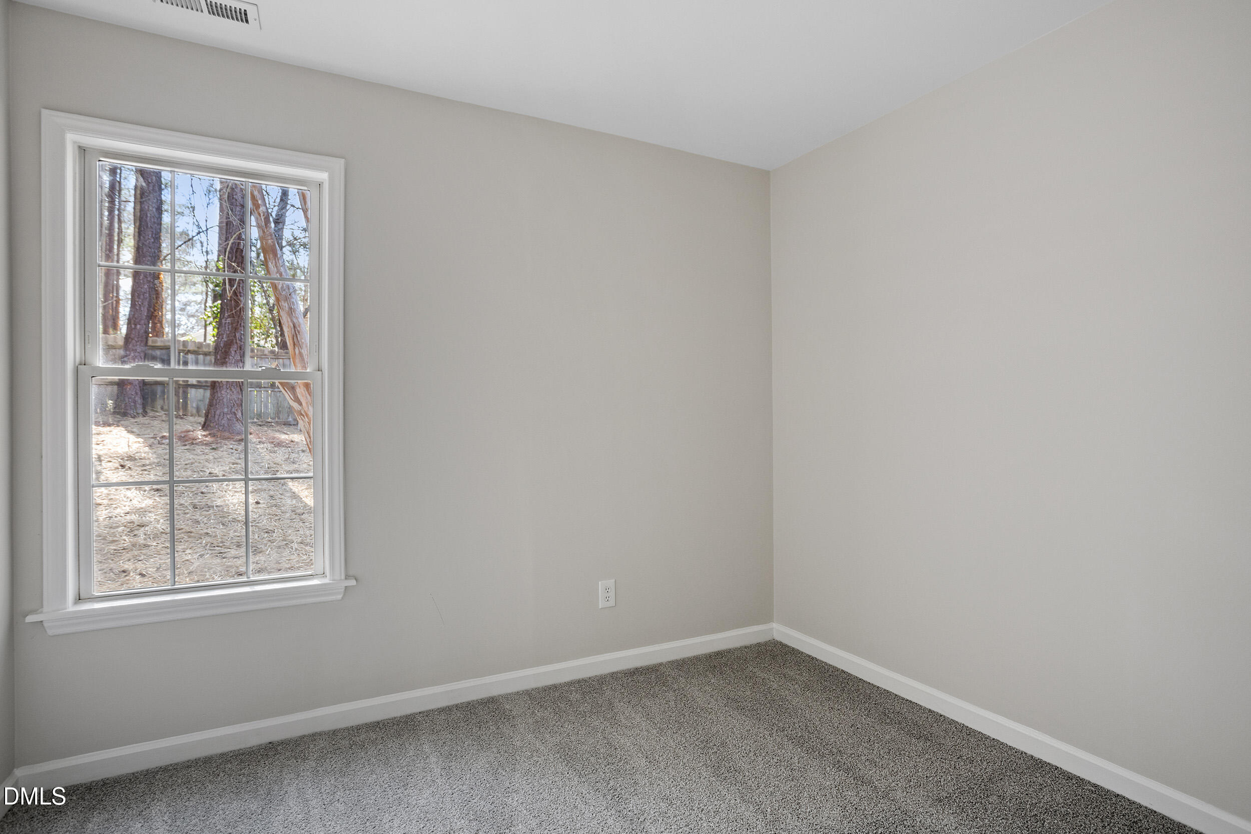 247 Tillamook Drive Wake Forest, NC 27587 - Photo 16 of 30 an empty room with windows