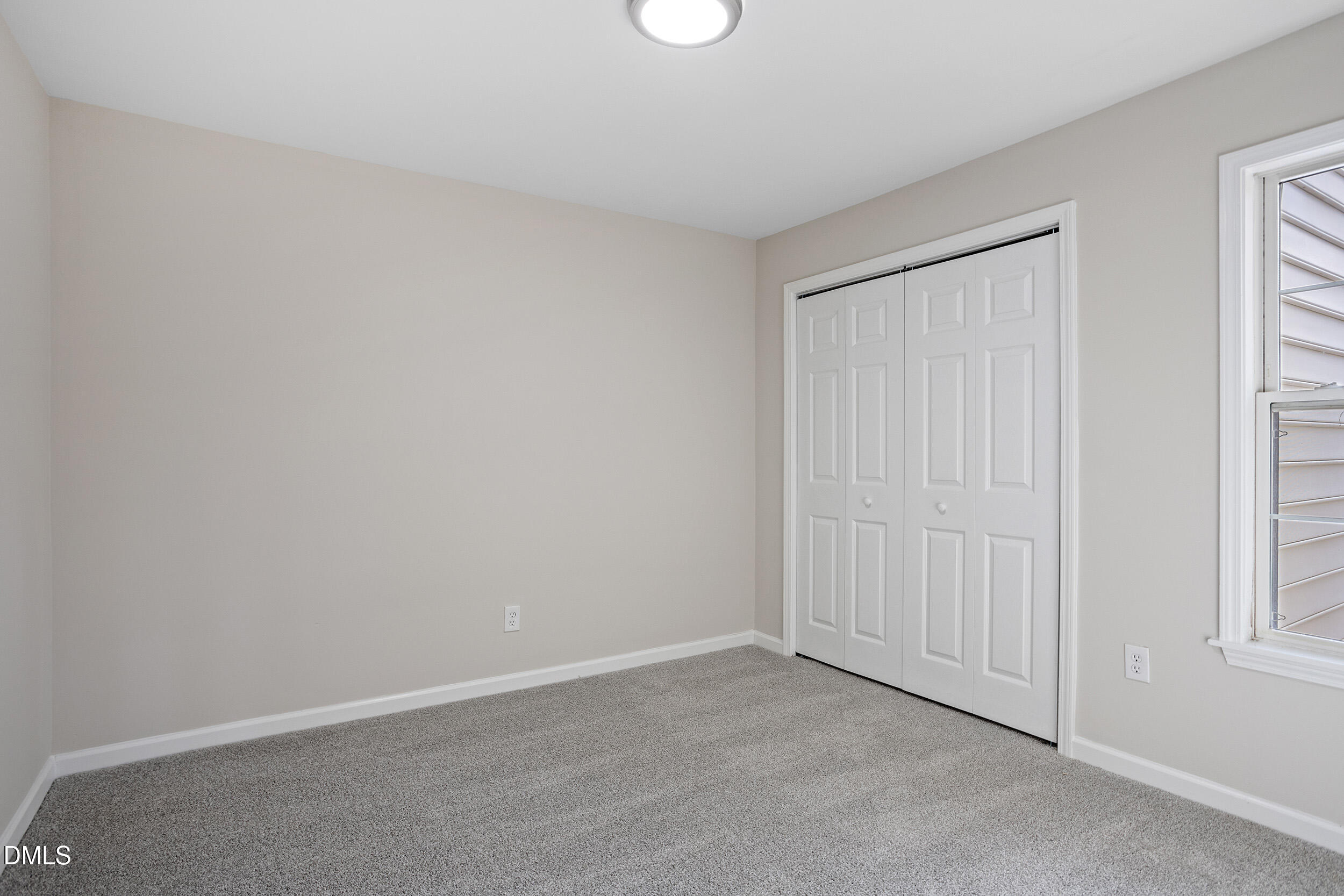 247 Tillamook Drive Wake Forest, NC 27587 - Photo 18 of 30 an empty room with windows