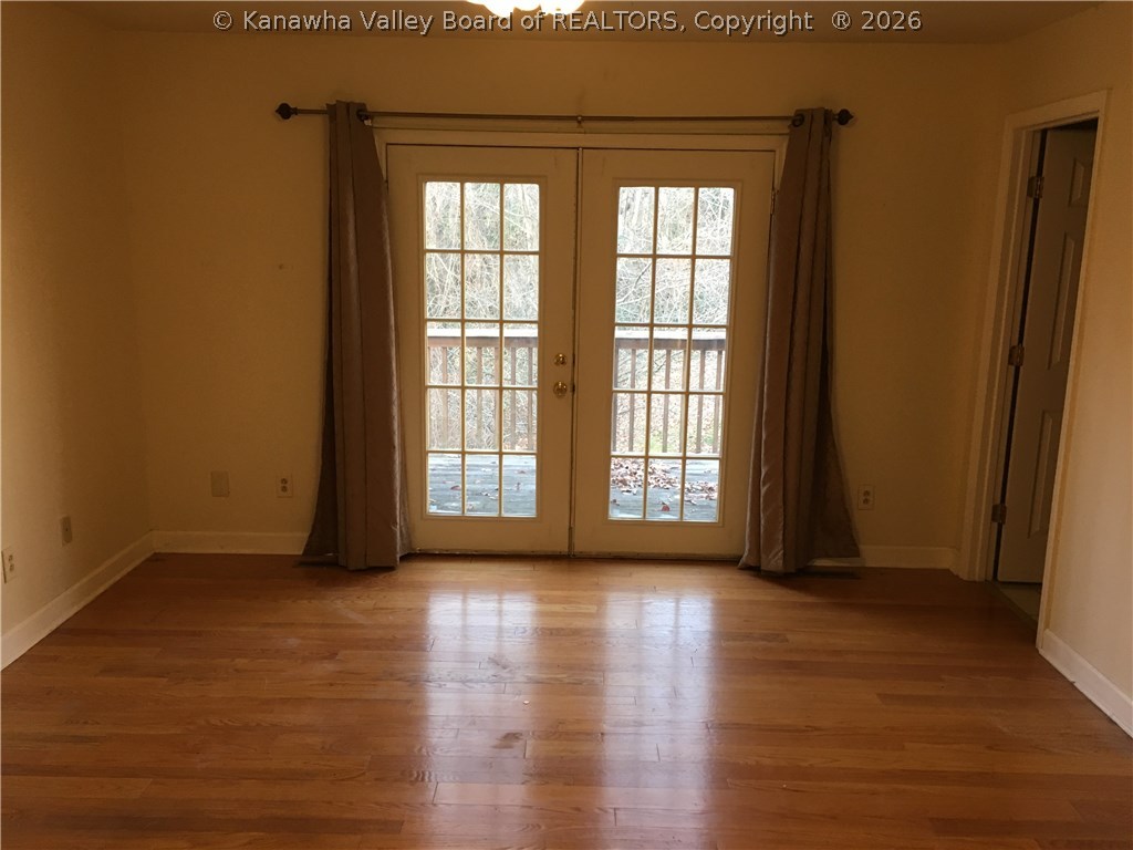 1013 Pine Road Charleston, WV 25314 - Photo 11 of 22 Master bedroom to deck area, master bath is door on right.