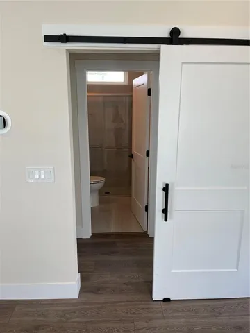 a view of a bathroom with a glass door