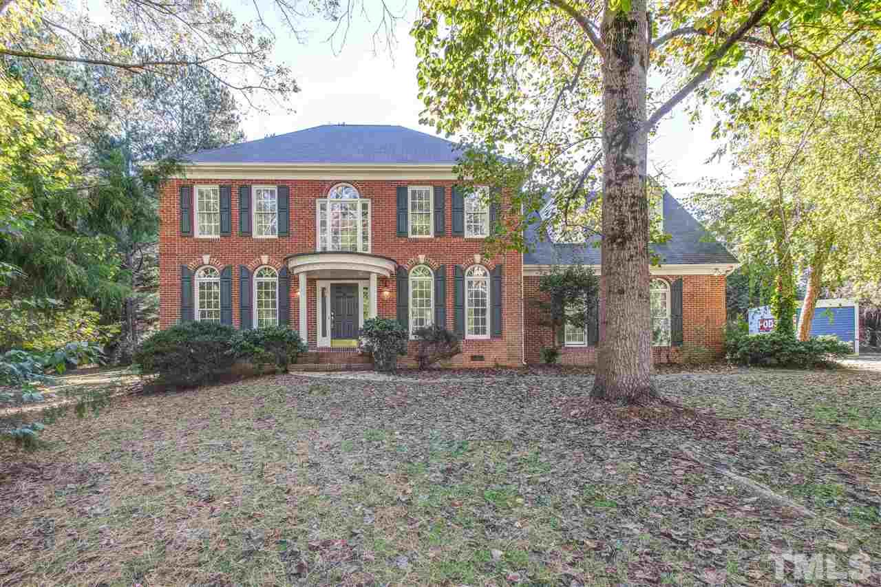 9024 Hemingwood Court Raleigh, NC 27613 - Photo 1 of 28 a front view of a house with garden