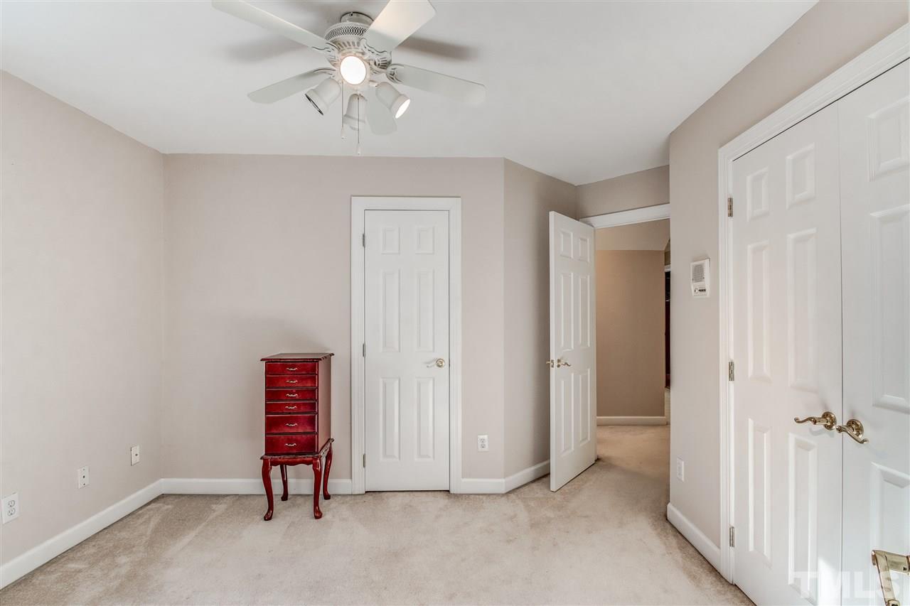 9024 Hemingwood Court Raleigh, NC 27613 - Photo 20 of 28 a view of an empty room with a fan