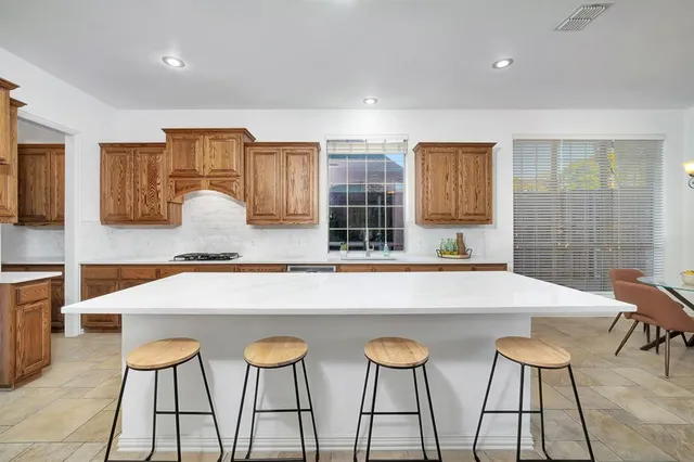 a view of kitchen with breakfast area