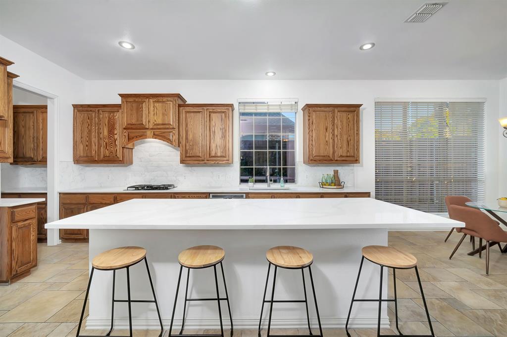 9328 Old Veranda Road Plano, TX 75024 - Photo 16 of 40 a view of kitchen with breakfast area