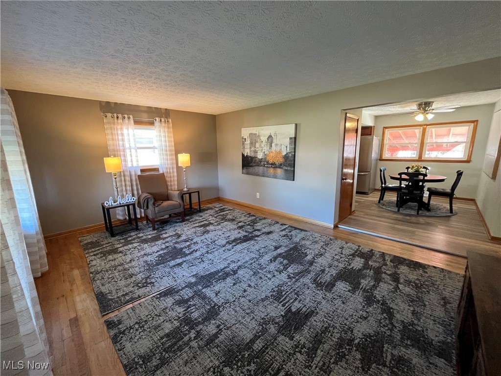 591 Ingalls Road Akron, OH 44312 - Photo 7 of 34 Enter Front Door and greeted by the Living Room and Hardwood Floors