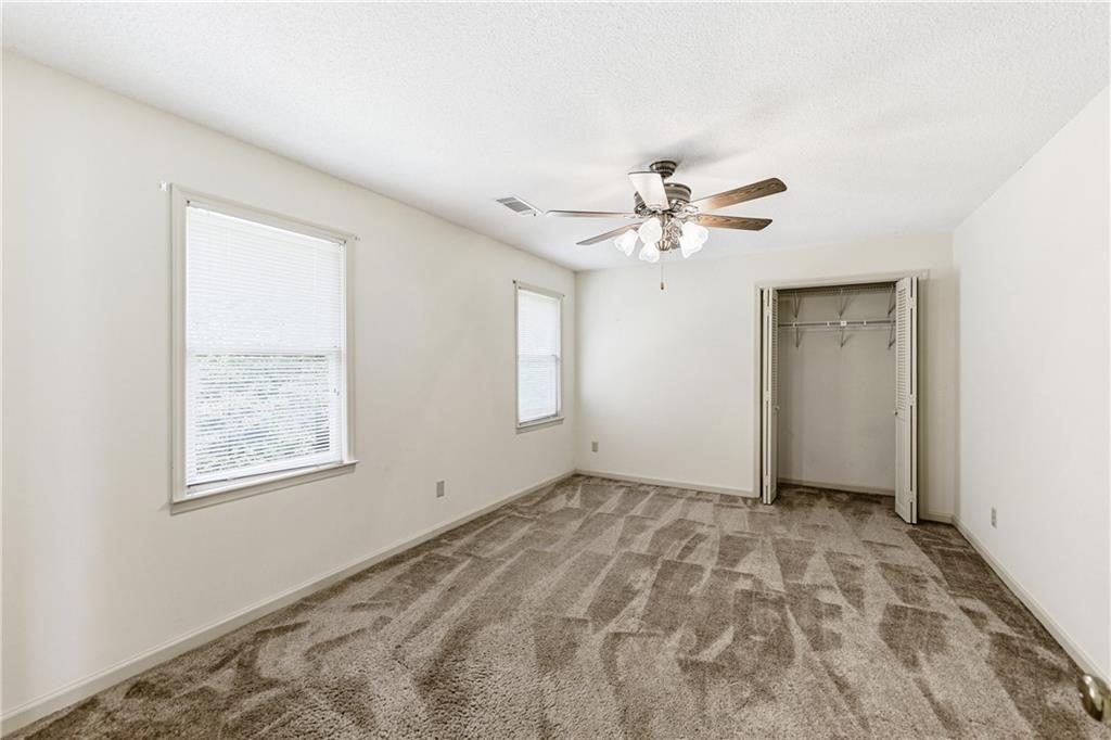 3608 Maple Forge Lane Gainesville, GA 30504 - Photo 27 of 45 a view of an empty room with a window