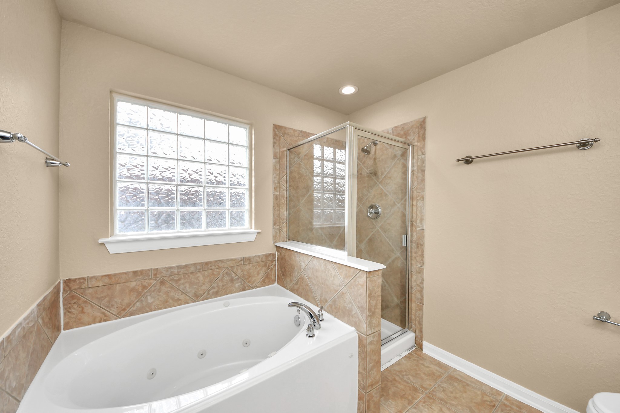 3122 Pathfinders Pass Spring, TX 77373 - Photo 14 of 23 a white bath tub sitting next to a window
