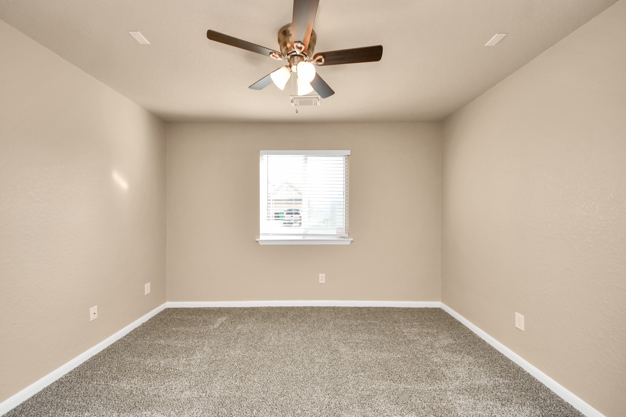 3122 Pathfinders Pass Spring, TX 77373 - Photo 9 of 23 an empty room with windows and fan