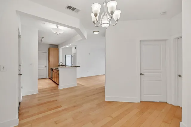 a view of a livingroom with wooden floor