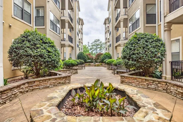 a view of a pathway with a yard